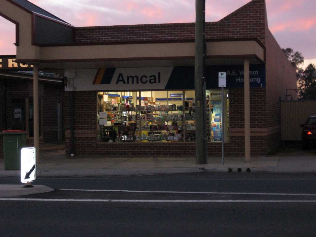 amcal pharmacy at dusk
